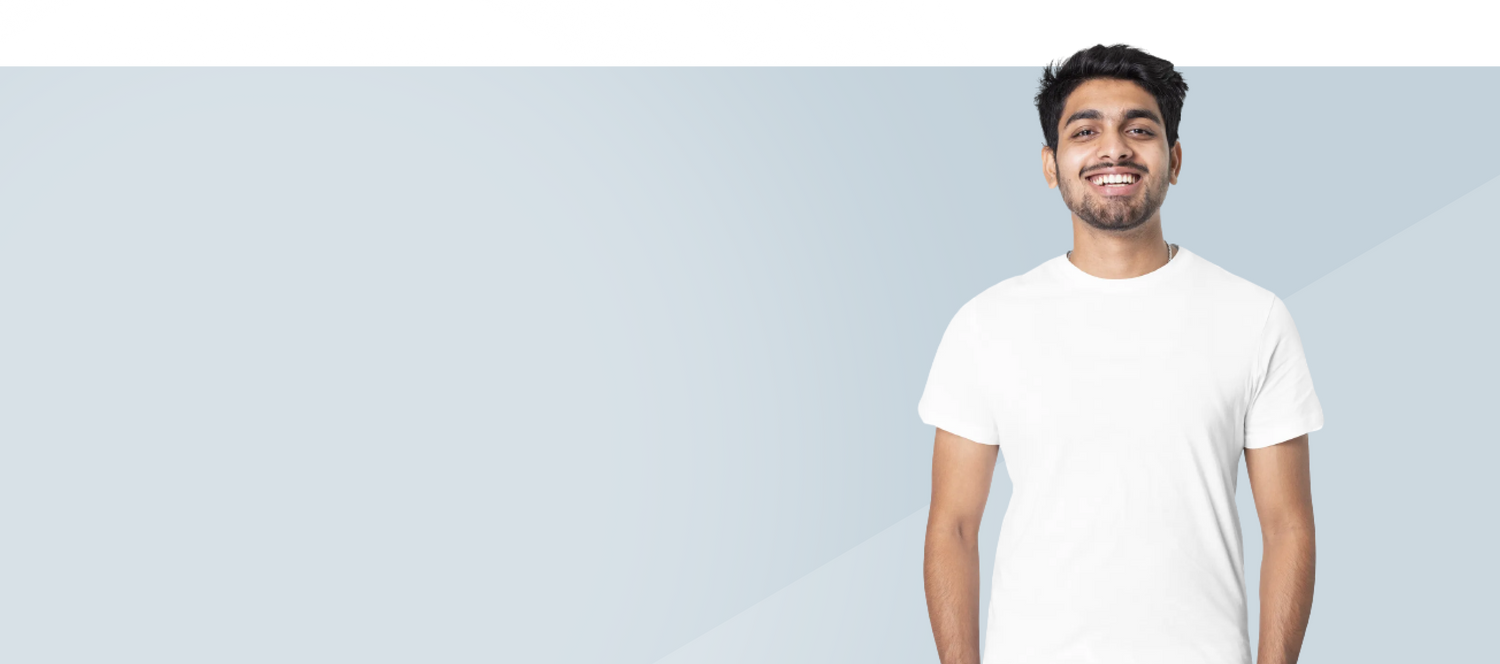 Man wearing white tee shirt smiling